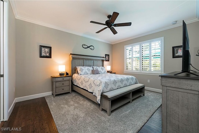 bedroom with dark wood-type flooring, ornamental molding, and ceiling fan