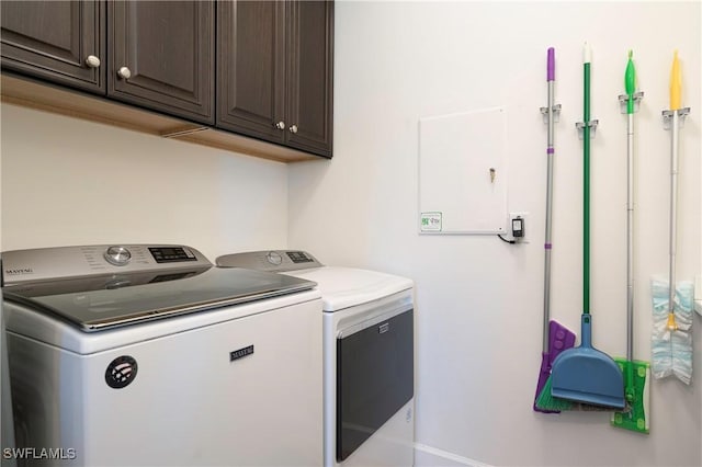 20256 Black Tree Ln, Estero, FL 33928 - clothes washing area with independent washer and dryer, cabinet space, and baseboards