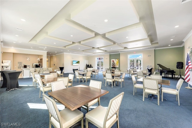 carpeted dining area with ornamental molding