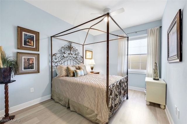 bedroom featuring ceiling fan and light hardwood / wood-style floors