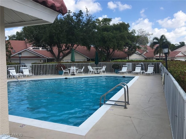 view of pool featuring a patio area