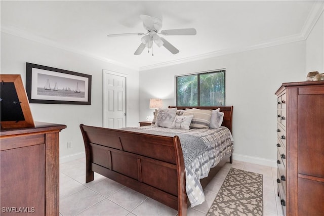 tiled bedroom with ceiling fan and ornamental molding