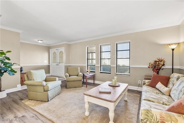 living room featuring ornamental molding and hardwood / wood-style flooring