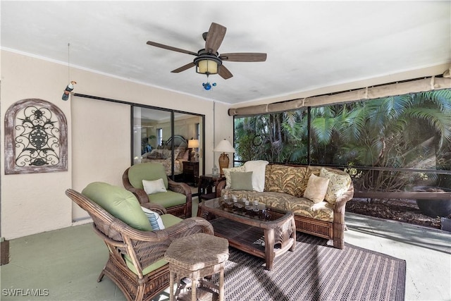 sunroom / solarium with ceiling fan