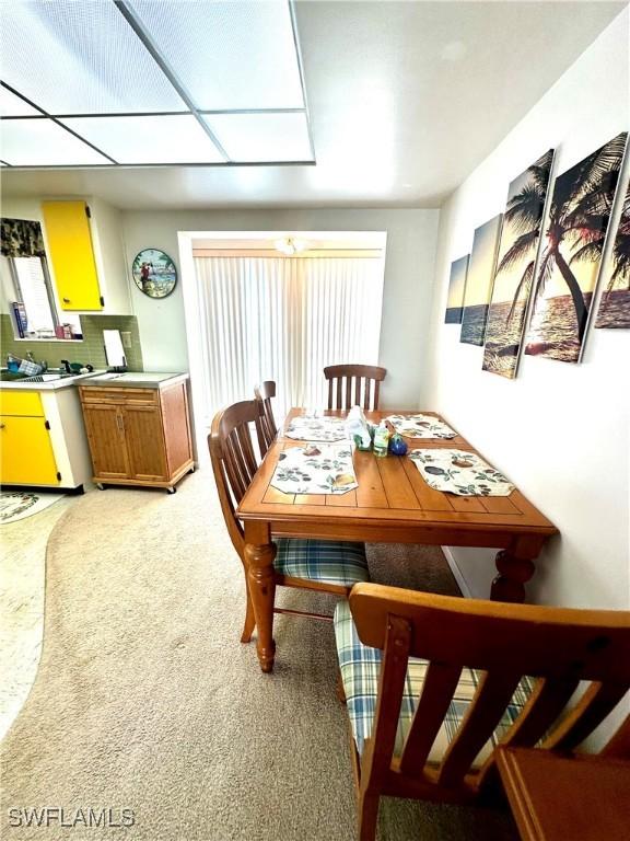 dining room featuring carpet floors