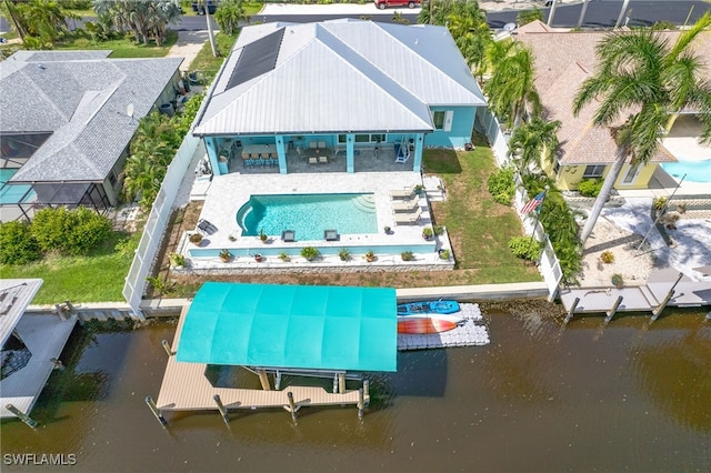 drone / aerial view featuring a water view