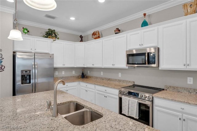 kitchen with stainless steel appliances and white cabinetry