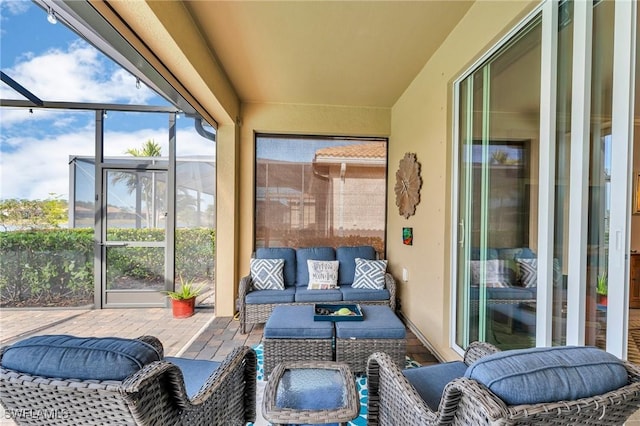 sunroom / solarium with a wealth of natural light