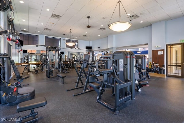 gym with a high ceiling