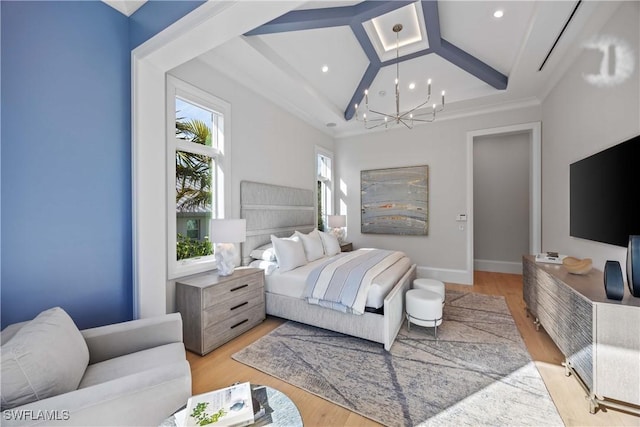 bedroom with a chandelier, light hardwood / wood-style floors, and beamed ceiling