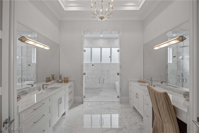 bathroom featuring separate shower and tub, vanity, a chandelier, and ornamental molding