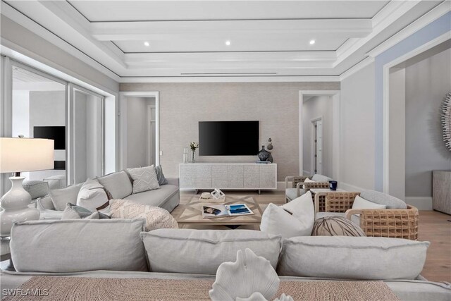 living room with beamed ceiling and light hardwood / wood-style floors