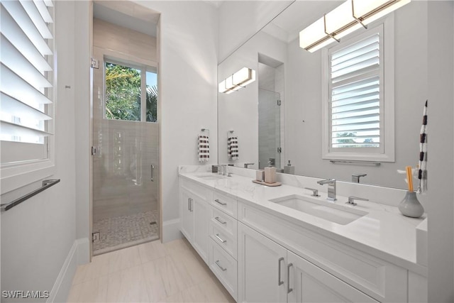 bathroom with vanity and walk in shower