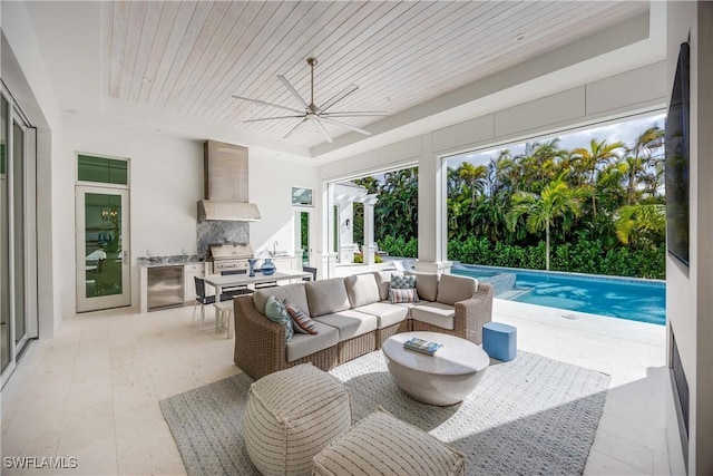 sunroom / solarium featuring ceiling fan and wood ceiling