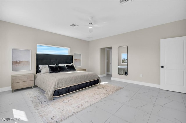 bedroom featuring marble finish floor, baseboards, visible vents, and a ceiling fan