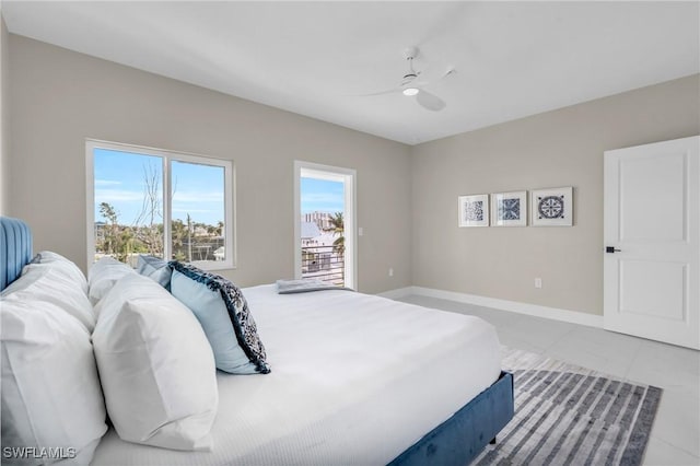 tiled bedroom featuring ceiling fan and access to exterior