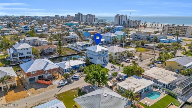 drone / aerial view with a water view and a view of city