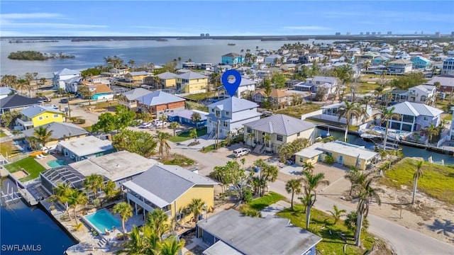 aerial view featuring a residential view and a water view