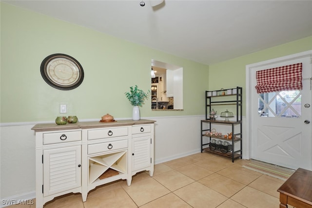 entrance foyer featuring light tile patterned floors