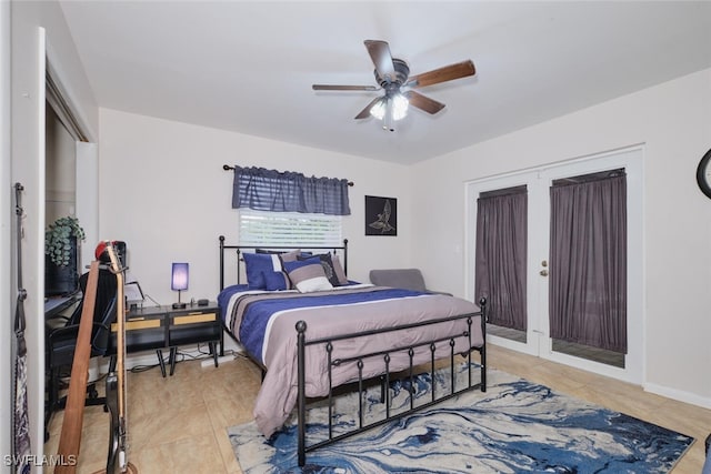 tiled bedroom with ceiling fan