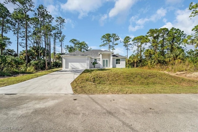 ranch-style home featuring a garage