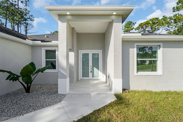 entrance to property featuring french doors