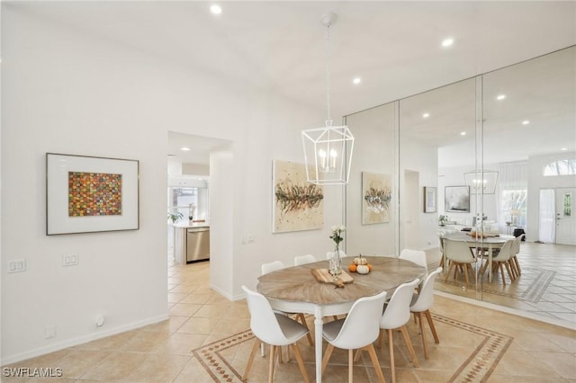 dining area featuring light tile patterned floors