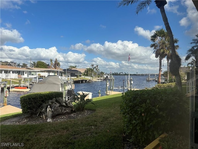 property view of water with a boat dock