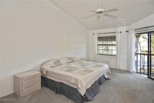 bedroom featuring ceiling fan, multiple windows, and vaulted ceiling