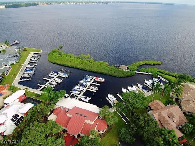 birds eye view of property featuring a water view