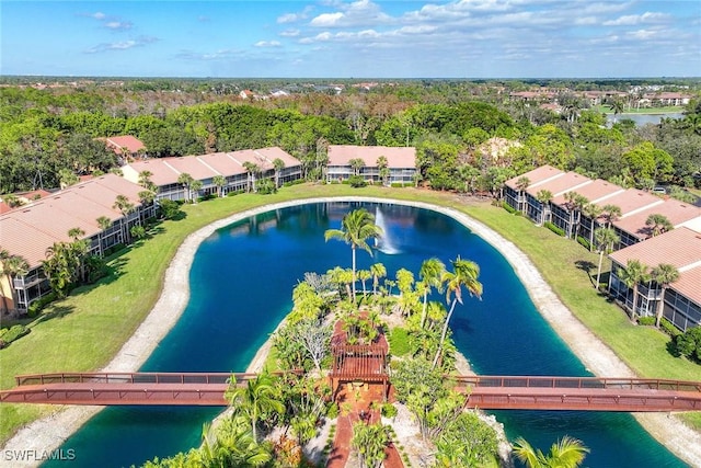 view of swimming pool with a water view