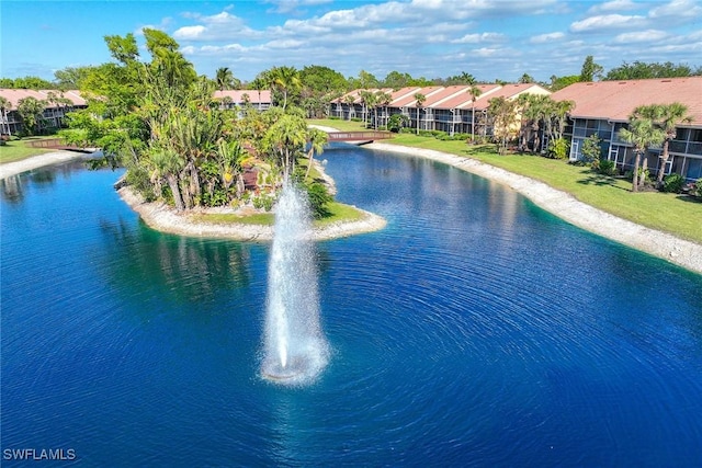 view of pool featuring a water view