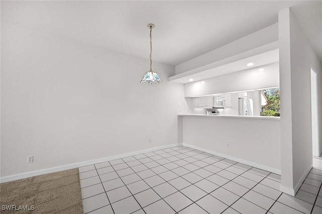 unfurnished room with baseboards and recessed lighting