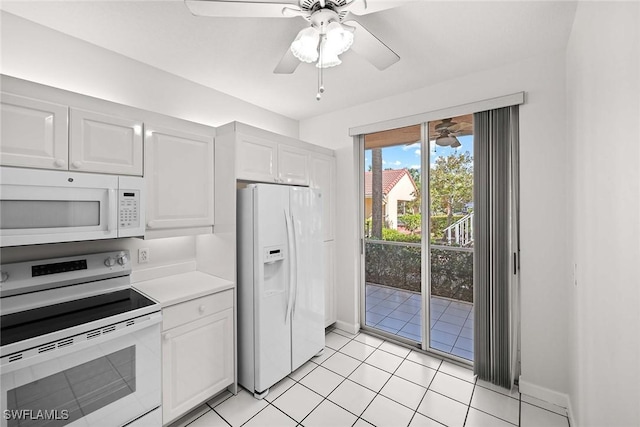 kitchen with a ceiling fan, light countertops, white appliances, and white cabinets