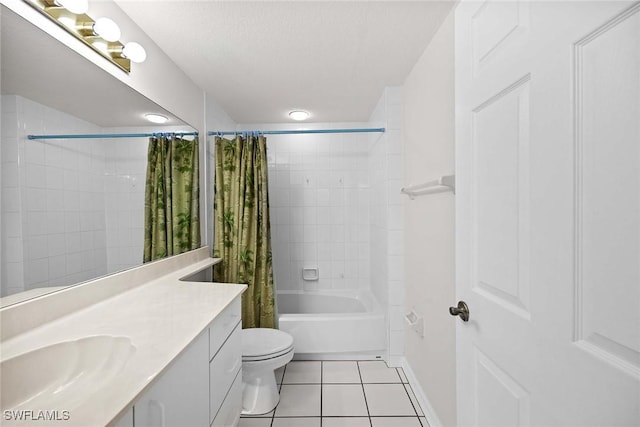 full bath featuring shower / tub combo with curtain, toilet, vanity, a textured ceiling, and tile patterned flooring