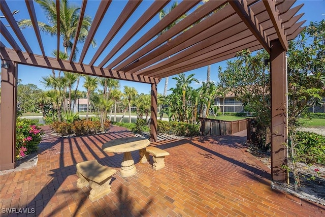 view of patio featuring a pergola