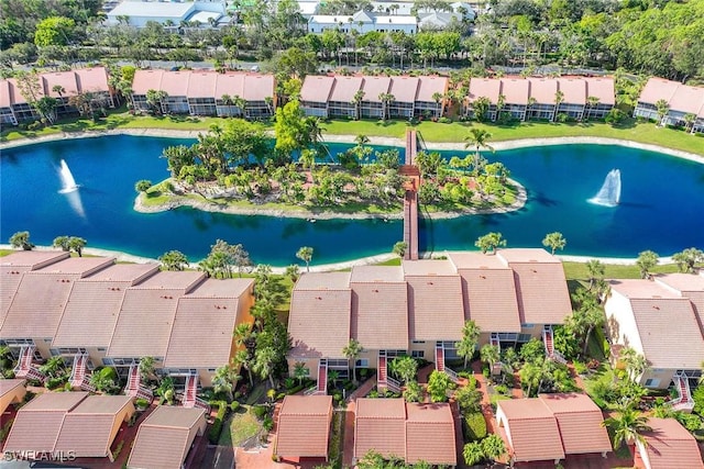 bird's eye view featuring a water view and a residential view