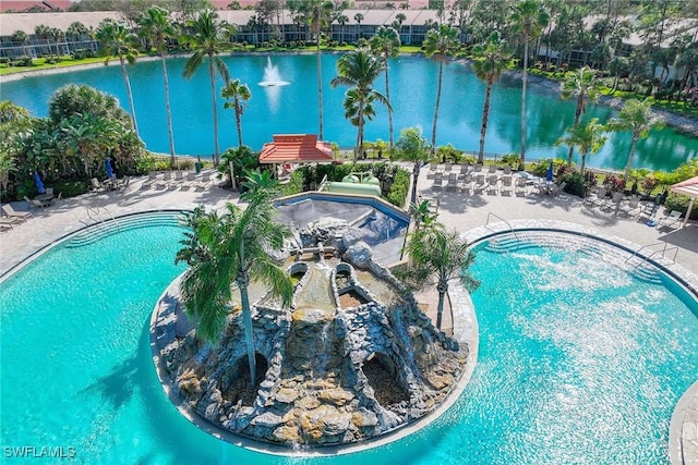 pool featuring a patio area, a community hot tub, and a water view