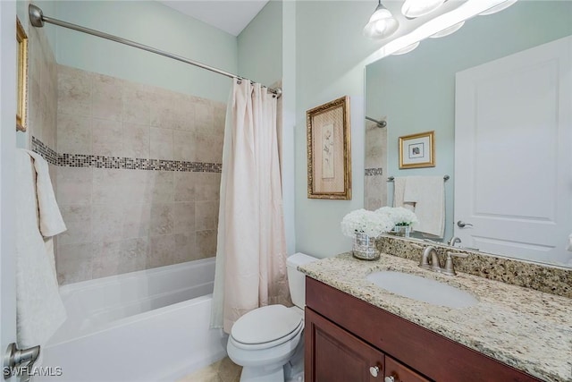 full bathroom with vanity, toilet, and shower / bath combo with shower curtain