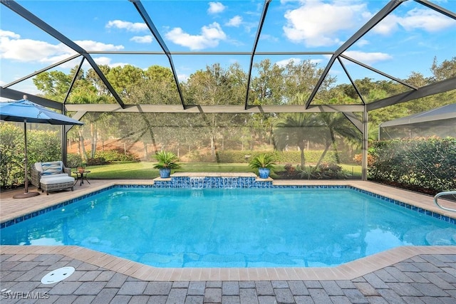 view of pool featuring a lanai and a patio area