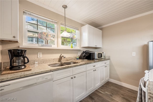 kitchen featuring white appliances, a sink, white cabinets, hanging light fixtures, and crown molding