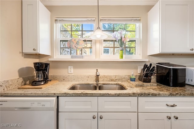 kitchen featuring a sink, white cabinetry, and dishwasher