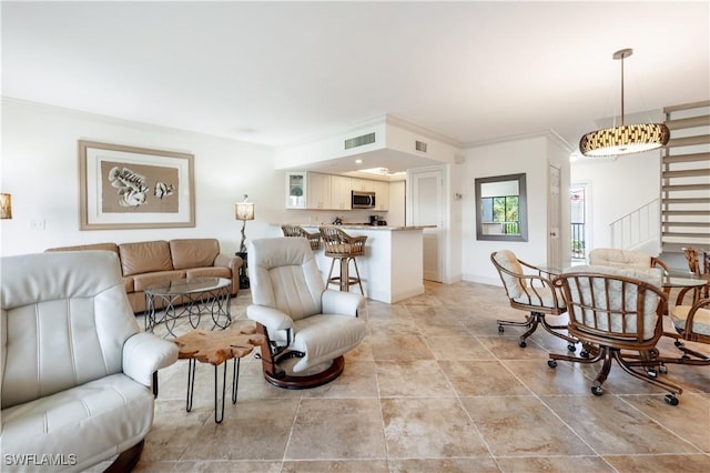 living room featuring ornamental molding