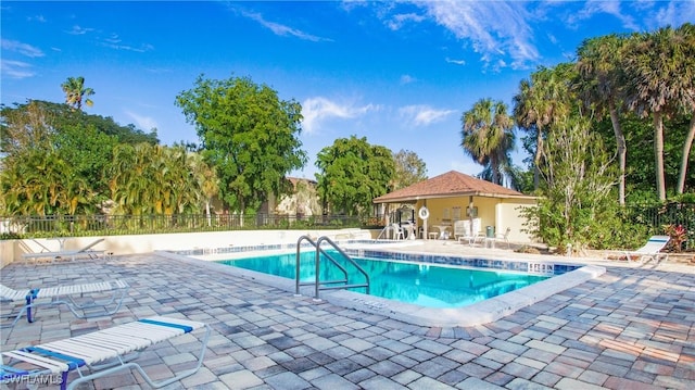 view of swimming pool featuring a patio