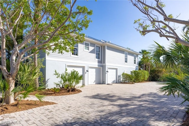 view of front of house with a garage