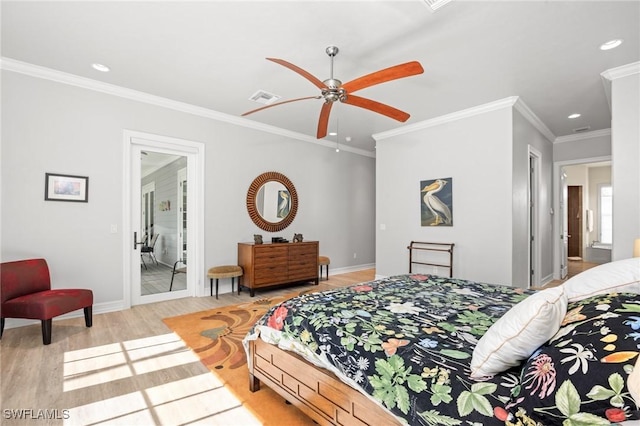 bedroom with ensuite bath, ceiling fan, light hardwood / wood-style flooring, and ornamental molding