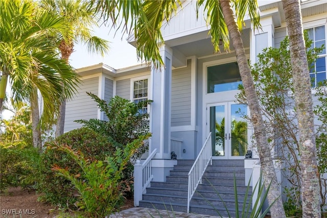 view of exterior entry featuring french doors