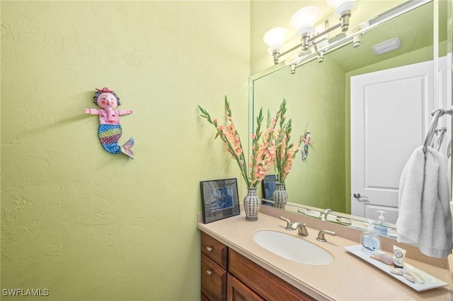 bathroom featuring vanity