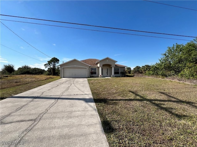 ranch-style home with a garage and a front yard