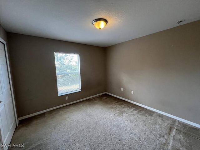 empty room with carpet floors